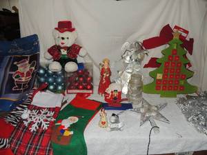 lot 93 image: Christmas lot lighted Santa, Star tree topper, angels, stockings and more