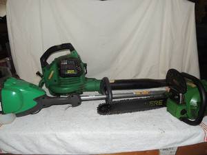 lot 97 image: John Deere chain saw, green weedeater 25cc engine, blower vac  all have compression