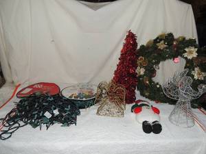 lot 109 image: Christmas lot- 200 count lights on a roll single strand, red Christmas tree 2 feet metal wicker angel and wreath
