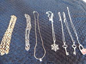 lot 116 image: link chains, snowflake necklace, 2 key necklaces, red and silver heart necklace