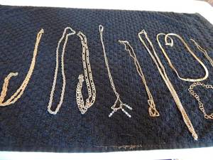lot 117 image: 6 costume gold necklaces 2 silver chains 1 herringbone gold costume chain and chain bracelet