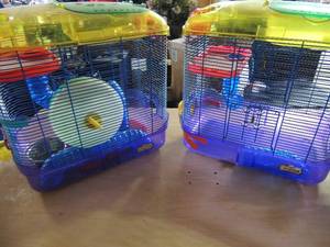 lot 122 image: 2 critter train hamster cages used but in good condition.