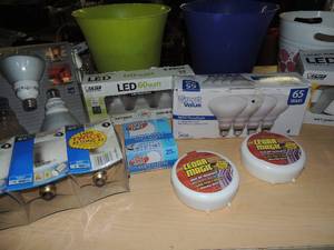 lot 124 image: Light bulbs various sizes, Cedar magic air freshener NIB 3 small plastic trash cans