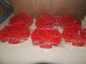 lot 125 image: Box full of new 30 jumbo red hair clips
