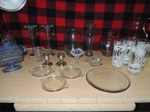 lot 137 image: Glass lot- 4 palm tree design glasses, 5 clear glasses, vases,2 chandelier design candle holders, blue covered candy dish and more