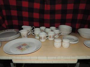 lot 143 image: Correlle dishes 2 designs all matches- first 11 dinner plates, 1 platter, 8 saucers, creamer, gravy boat, 8 cups. Second set S&P set 2 soup bowls 6 dessert plates 8 bowls and 1 misc. Of corning small plate