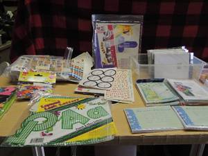 lot 150 image: Art and scrapbook materials, 10 packs of baby shower invitations incomplete boxes, baggie of stickers new and used