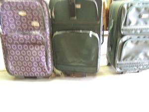 lot 158 image: Skyline and Modena suitcase small size 2 green 1 purple with white circles