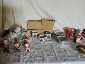 lot 34 image: Large Christmas lot- 8 Christmas bowls, 8 Christmas cups, various Christmas coffee mugs, 5 Santas and elfs 4 inches tall and more