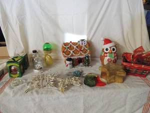 lot 35 image: Christmas lot- lights, NIB single bulbs for tree, Christmas  owl cookie jar, Christmas basket and more.