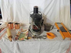 lot 40 image: Jack LaLane power juicer with instructions and attachments. Bon Appetite cheese grater, hand mixer, 2 tin coffee cups and a rolling pin