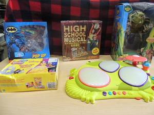 lot 171 image: My B-toy music frog drummer, Bugs life hopper NIB, High school musical game NIB Disney play dough set NIB and batman pop up game NIB
