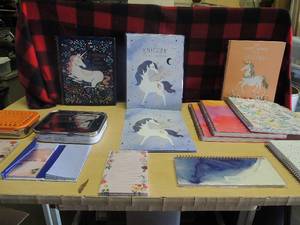 lot 174 image: NEW- hard back spirals, note pads, unicorn folders 10, 2 lunch boxes 52 week planner and more