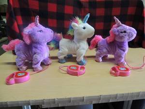 lot 177 image: Connection Renate Unicorns. Push a button and they walk with you
