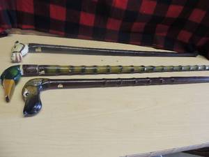 lot 184 image: Wooden canes- 1 with horse head, 1 with dog head and 1 with duck head