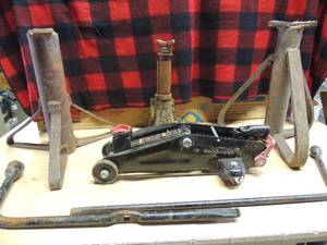 lot 201 image: 2 heavy duty jack stands, good wrench car jack, 2 tire tools, unknown brand small car jack