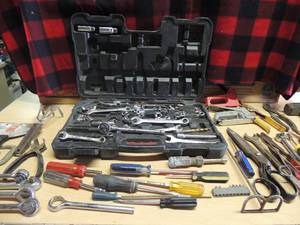 lot 206 image: Gray tub of assorted tools, screw drivers, sockets, sheers, scissors, nail gun, staplers, wire cutter, hammers and more
