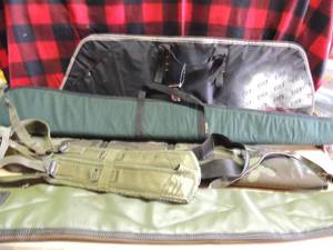 lot 213 image: Several shot gun bags and a gun shoulder strap