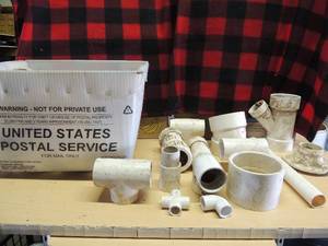 lot 232 image: White tote full of various PVC piping all sizes and kinds