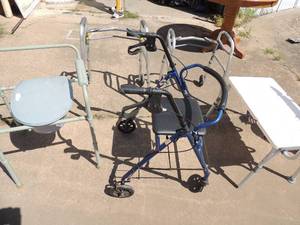 lot 14 image: Medical lot- shower chair, new bedside commode new, 2 small child size walkers all by unicare adult 4 wheel seated blue Guardian walker