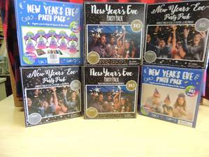 lot 17 image: 4 boxes of new years eve party packs for 10 people- foil streamers, blowers, bead necklaces, hats, confetti and 5 tiaras