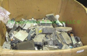 lot 127 image: Assorted automotive Powertrain Control modules (PCM) generous quantity Gaylord tote 34 full