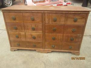 lot 1 image: ANTIQUE OAK WOOD&nbsp 8- DRAWER DOUBLE DRESSER&nbsp5FT L X 21 W X 37 H&nbsp &nbsp2 LEGS NEED TO BE PUT BACK ON .BOTH ARE PRESENT .