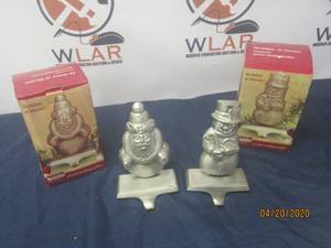 lot 90 image: TOTAL OF 4 CLASSIC SOLUTION HOLIDAY AT HOME BRASSWARE&nbsp PEWTER STOCKING HOLDERS&nbsp&nbspSANTA &amp SNOWMAN&nbsp