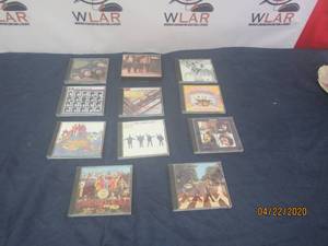 lot 167 image: TOTAL OF 11 BEATLES CDS IN ORIGINAL CASE&nbsp-THE YELLOW SUBMARINE&nbsp&nbsp- THE BEATLES -HELP-LET IT BE&nbsp-REVOLVER&nbsp- THE BEATLES LIVE AT THE BBC AND MORE SEE PICS&nbsp
