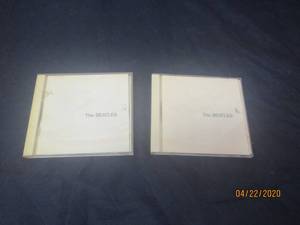 lot 169 image: TOTAL OF 2 CDS THE BEATLES DISC 1 &amp DISC 2 IN ORIGINAL CASE&nbsp