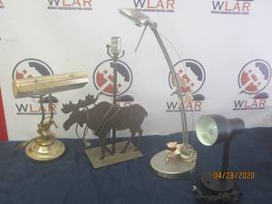 lot 224 image: TOTAL OF 4 LAMPS&nbsp&nbsp- BLACK GOOSENECK TABLE DESK LAMP&nbsp&nbsp- BRASS ROUND PIANO LAMP&nbsp&nbsp-CHROME&nbsp LED DESK LAMP&nbsp-VINTAGE MOOSE TABLE LAMP WITH A FRONTIER RUST FINISH&nbsp