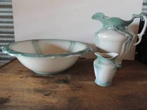 lot 154 image: Large porcelain washbowl and pitcher and small matching vanity canister