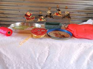 lot 169 image: 4 tier Christmas sleigh candle holder , ribbon dcor and platters plus more