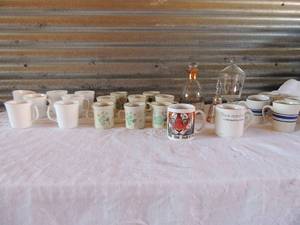 lot 171 image: Coffee cups- 7 Corningware, 8 nitto floral, meadow stone, 4 blue and white Mainstay and 2 50th anniversary glasses