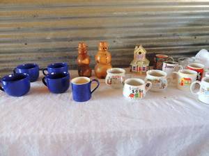 lot 175 image: Lot of coffee mugs, 2 wooden snowmen by art banner, candy shop tea light candle, tomato soup cup and onion soup cup, 4 large coffee cups from Pier One imports stoneware collection