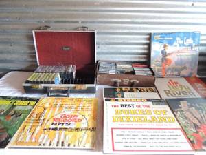 lot 194 image: Records over 25- Sergio Mendez, Harry James, Gold Record hits, The ventures Christmas album and cassette tapes x 2 boxes Helen Reddy, Thriller, Duffys tavern Nat King Cole etc.