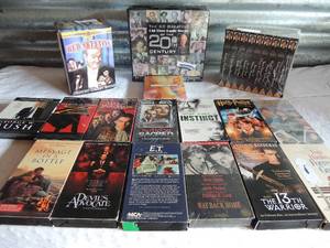 lot 195 image: VHS lot  Financial freedom set of 9 NIB, Red Skelton collector set NIB, Harry potter, ET, Message in a Bottle Devils advocate and many more plus cassette tape set of old time radio shows (20 tapes 60 hours 30 programs)