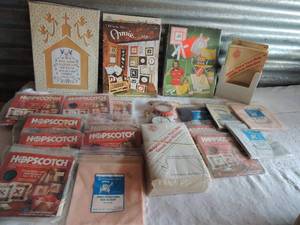 lot 196 image: Sewing lot- cross stich fabrics, Iron on patches, ironing board , box is full