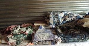 lot 199 image: Queen size sheets, curtains, full size comforter and 2 throw blankets