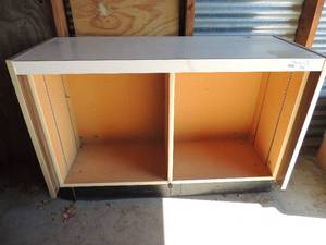 lot 210 image: Cabinet with no doors 28H x 42L x 16Wide