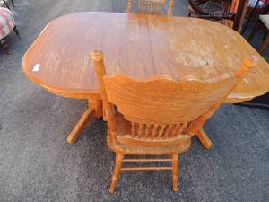 lot 213 image: Nice kitchen table with 2 CAPTAIN Chair  Scratches on top 60x 41 x 30 needs some TLC