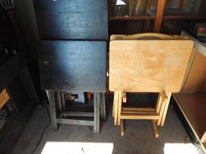 lot 215 image: TV trays  1 tan with 2 trays 2 large black and 1 small black Trays