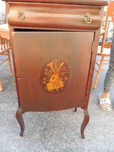 lot 216 image: Small  vanity with door , music cabinet, has shelf - back needs  reattached