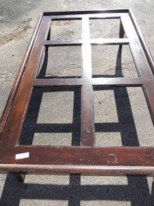 lot 219 image: Wooden coffee table needs glass top 18 H x 66L x40W