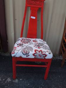 lot 223 image: red high back chair with padded seat red grey black flower pattern.