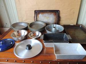 lot 249 image: Baking pans, cookie sheets, mixing bowls, bread pans, Bundt cake, cornbread pans and more