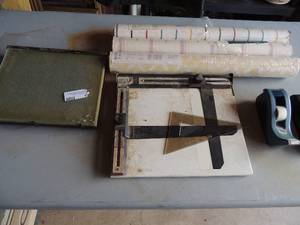 lot 321 image: Stapler, tape roll, 3 NIP rolls of wallpaper, glass pic frame, accute measure table