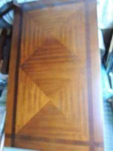 lot 9 image: Dining room table with 4 chairs  table has small scratch glass top