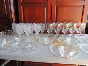 lot 23 image: 5 glass snowflake design plates with glass cupsfor crackers and wine, 10 fall design wine glasses, 10 blown glass drinking glasses and various crystal bowls