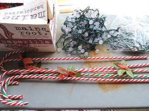 lot 59 image: Christmas lot yard candy canes,lighted garland and more